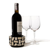handmade rectangular bone inlaid into black wood bottle coaster with wine bottle and two wine glasses