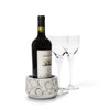 handmade white and beige inlaid natural tagua seed wood bottle coaster with one wine bottle and two crystal glasses