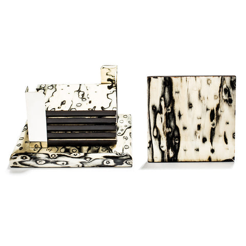 handmade black and cream ojo de pajaro and german silver wood square coasters on base
