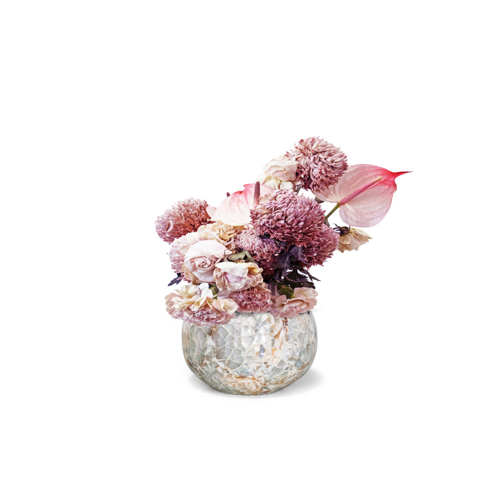 A Mother of Pearl 6" Bowl Vase by LaDorada, handcrafted with exquisite detail, showcasing Colombian artistry.