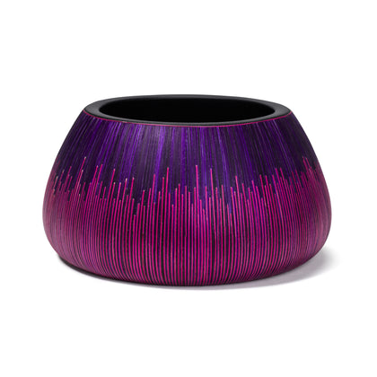 A Violet Eclipse Accent Bowl by LaDorada, handcrafted with exquisite detail, showcasing Colombian artistry.
