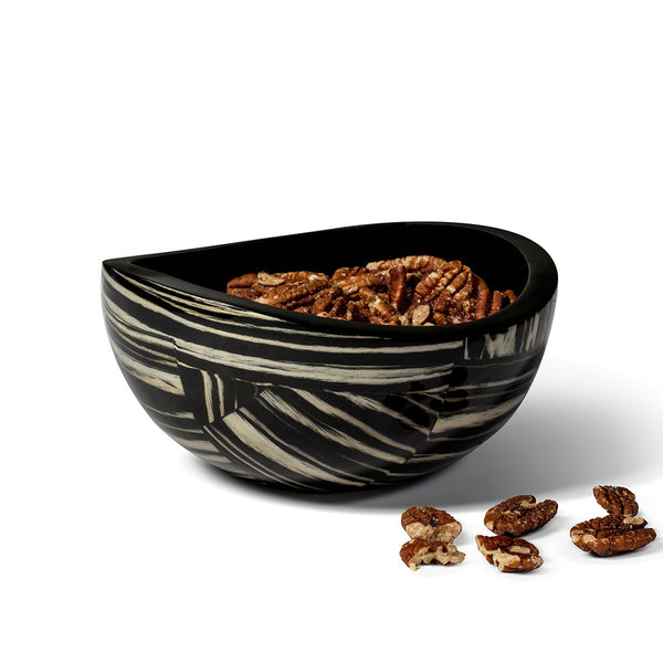 handmade black and white striped ebano veneer wood accent bowl containing pecans inside