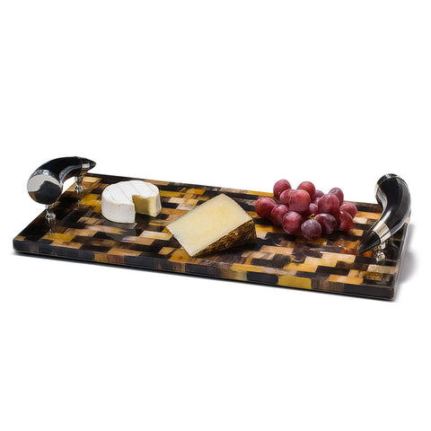 handmade black and light brown chequered natural horn rectangular serving board with two horn handles and grapes and cheese