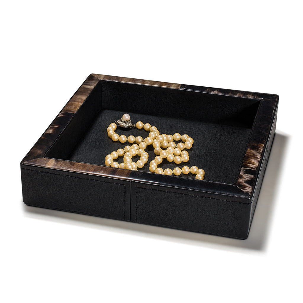 handmade black stitched leather square catch-all with dark brown and cream horn border and jewelry inside