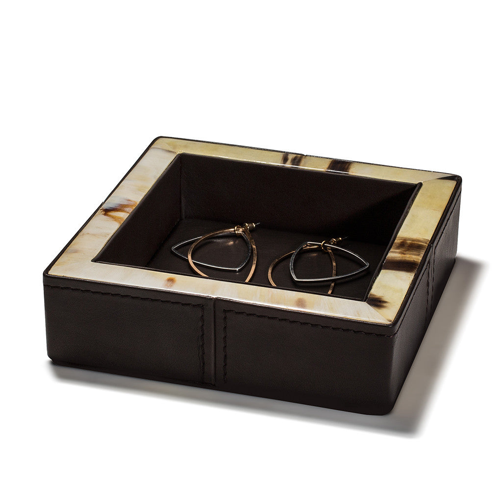 handmade dark brown stitched leather square catch-all with beige and brown horn border and jewelry inside