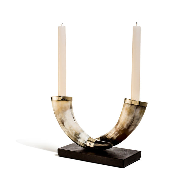 handmade cream and dark brown horns with german silver and dark brown leather base with two white taper candles 
