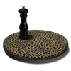 handmade light brown bamboo rings on black wood round round lazy susan with pepper grinder on top 