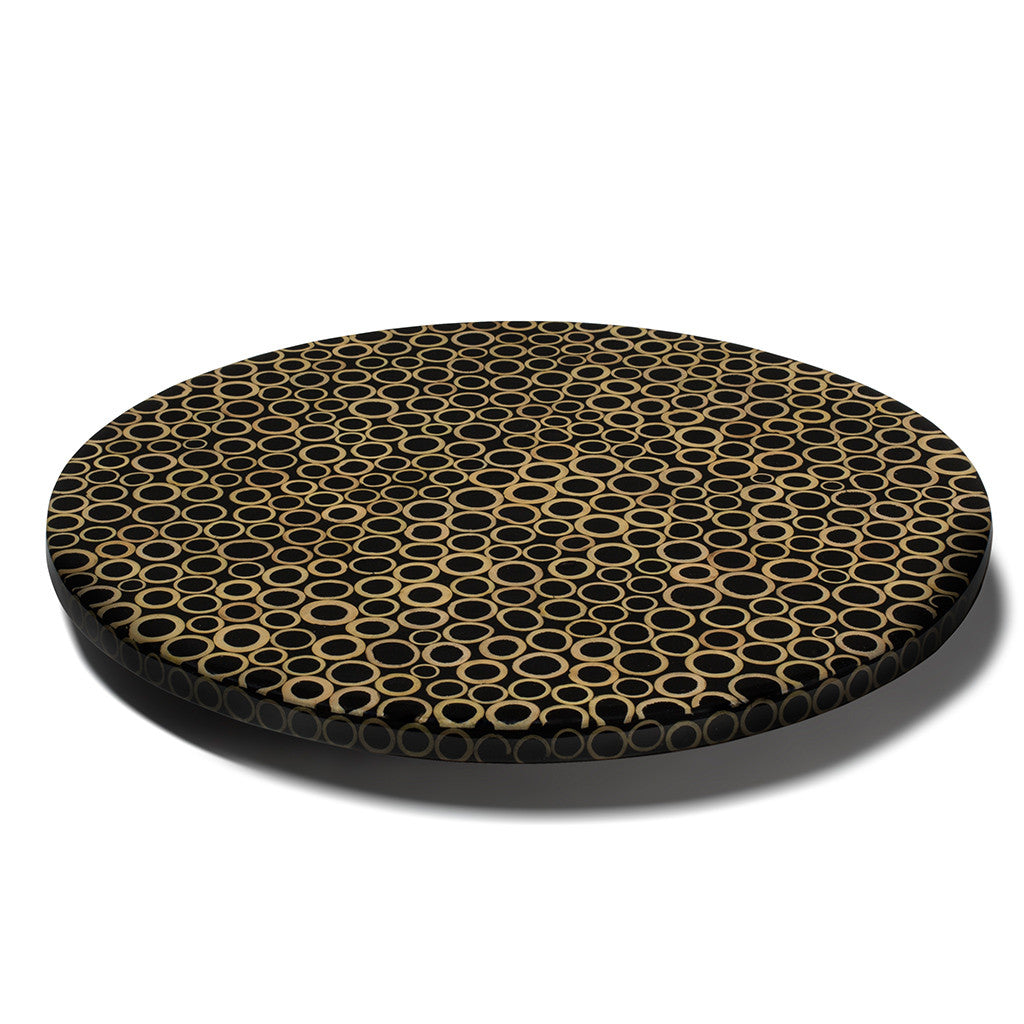 handmade light brown bamboo rings on black wood round round lazy susan 