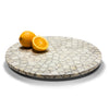 handmade tagua seed round white and grey pattern on wood round lazy susan revolving tray with oranges on top