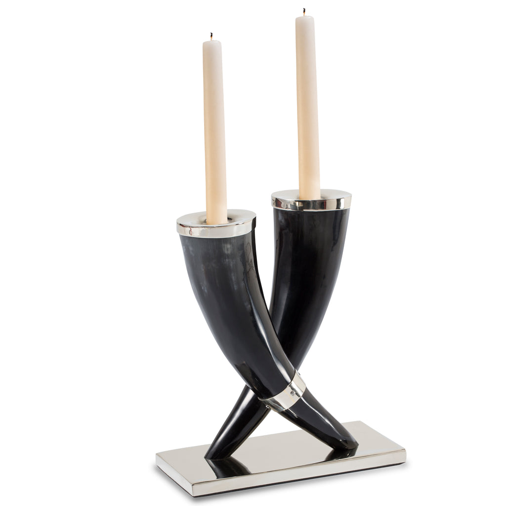 handmade black and grey variegated natural horn candle holders with german silver accents set on german silver base and two ivory taper candles