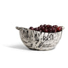 handmade cream and black spotted ojo de pajaro serving bowl with two c-shaped german silver handles and cherries 