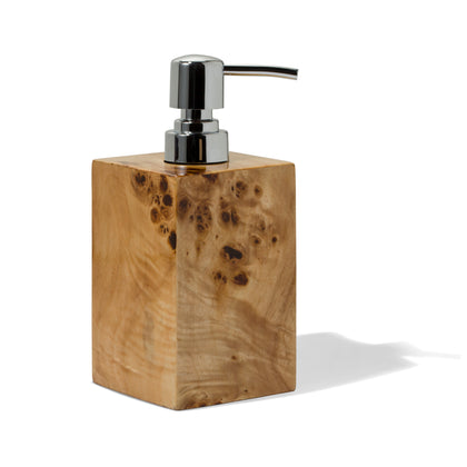 The Burl Veneer Soap Dispenser from LaDorada handcrafted with exquisite detail, embodying timeless elegance and craftsmanship.